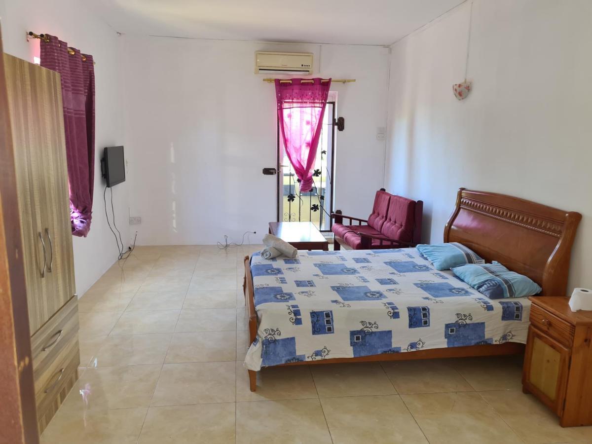 Aparthotel Oasis Tropical à Pereybere Beach Extérieur photo