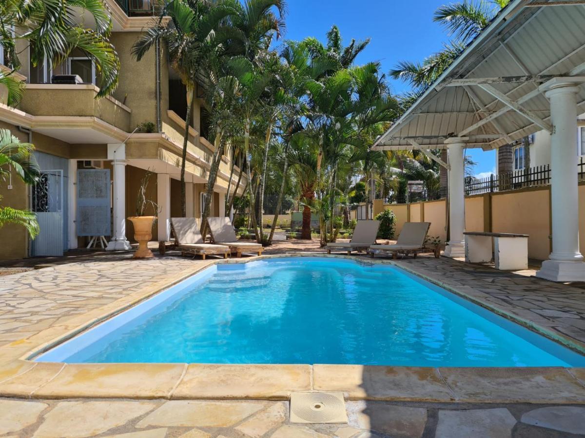 Aparthotel Oasis Tropical à Pereybere Beach Extérieur photo